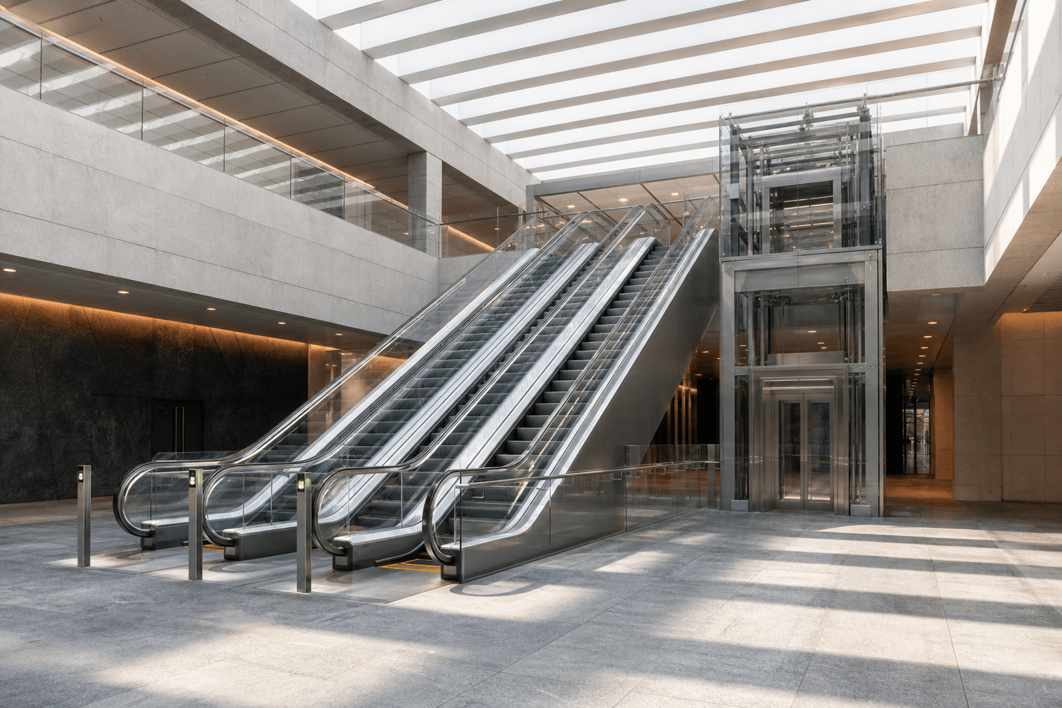 Concept visualization of escalators and an accessible elevator in a public concourse